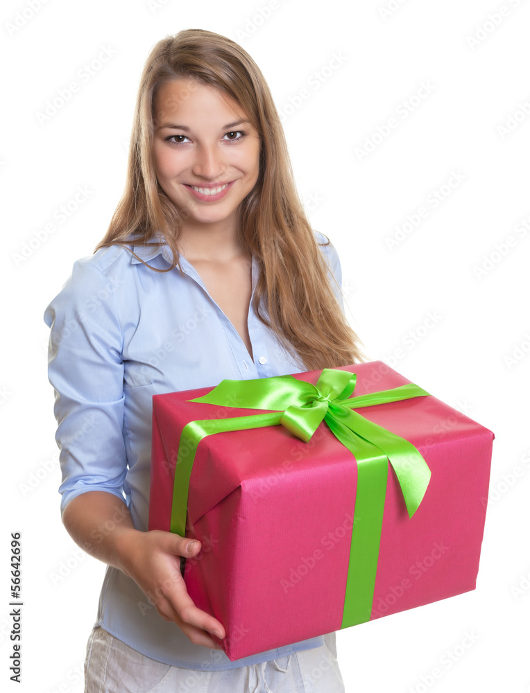 Beautiful woman with christmas gift in her hands