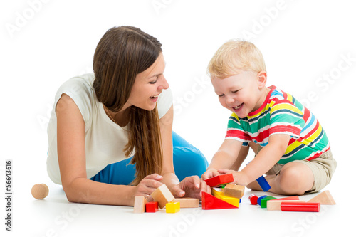kid boy playing toys togeth...