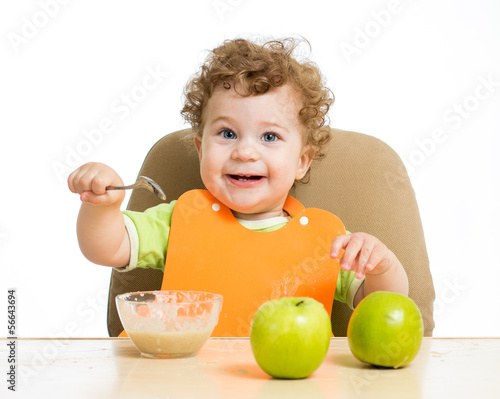 baby eating by himself
