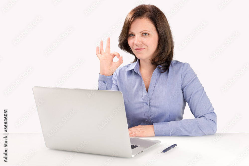 Business woman is sitting in front of a laptop Business woman is sitting in front of a laptop