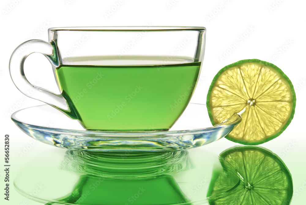 Green tea with lemon on a white background. Green tea with lemon on a white background.