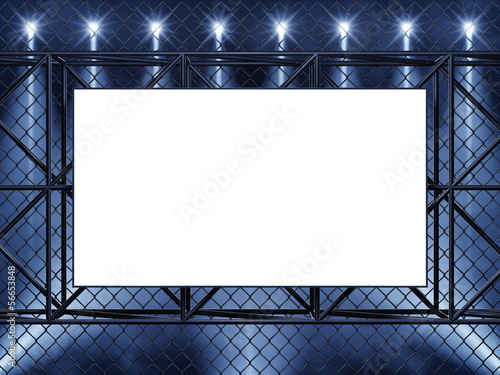 Empty display , chainlink fence and spotlights