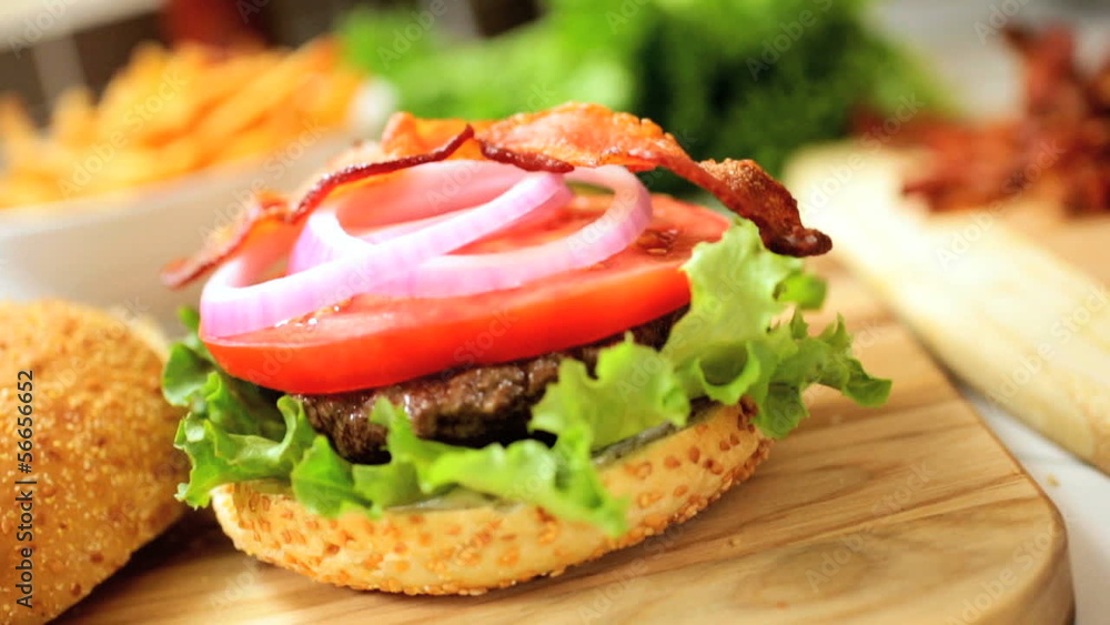 Hands Preparing Classic Bacon Burger Close Up Hands Preparing Classic Bacon Burger Close Up