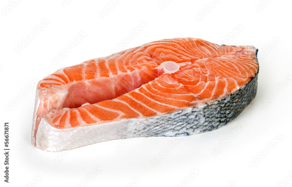fresh uncooked red fish fillet over white fresh uncooked red fish fillet over white