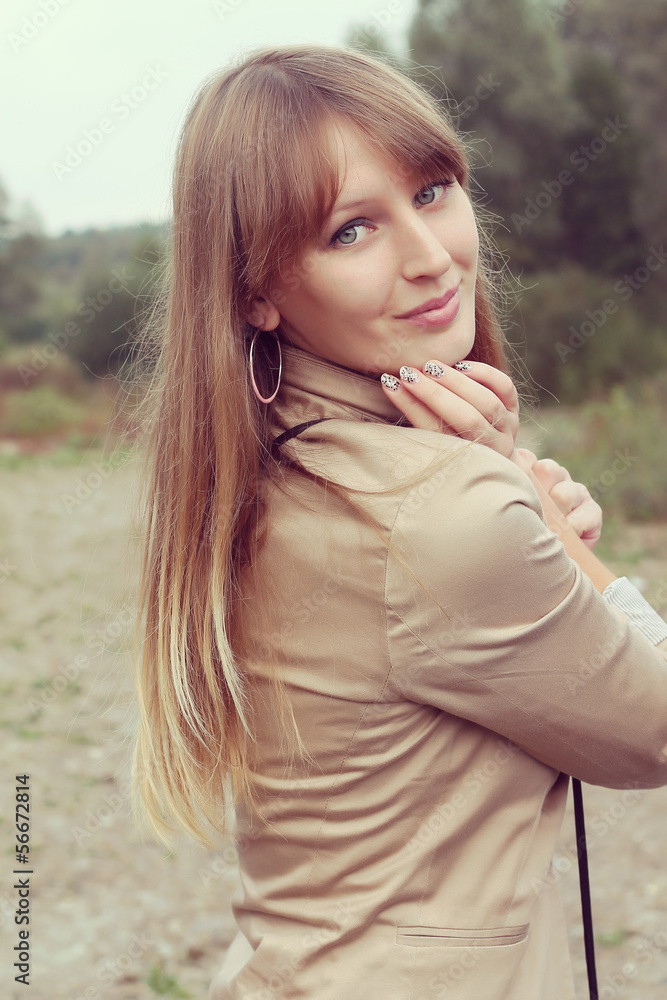 Portrait of elegantly dressed young gorgeous blond woman. Portrait of elegantly dressed young gorgeous blond woman.