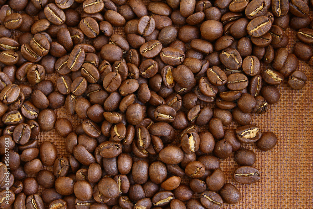 Coffee beans on grung wooden board background Coffee beans on grung wooden board background