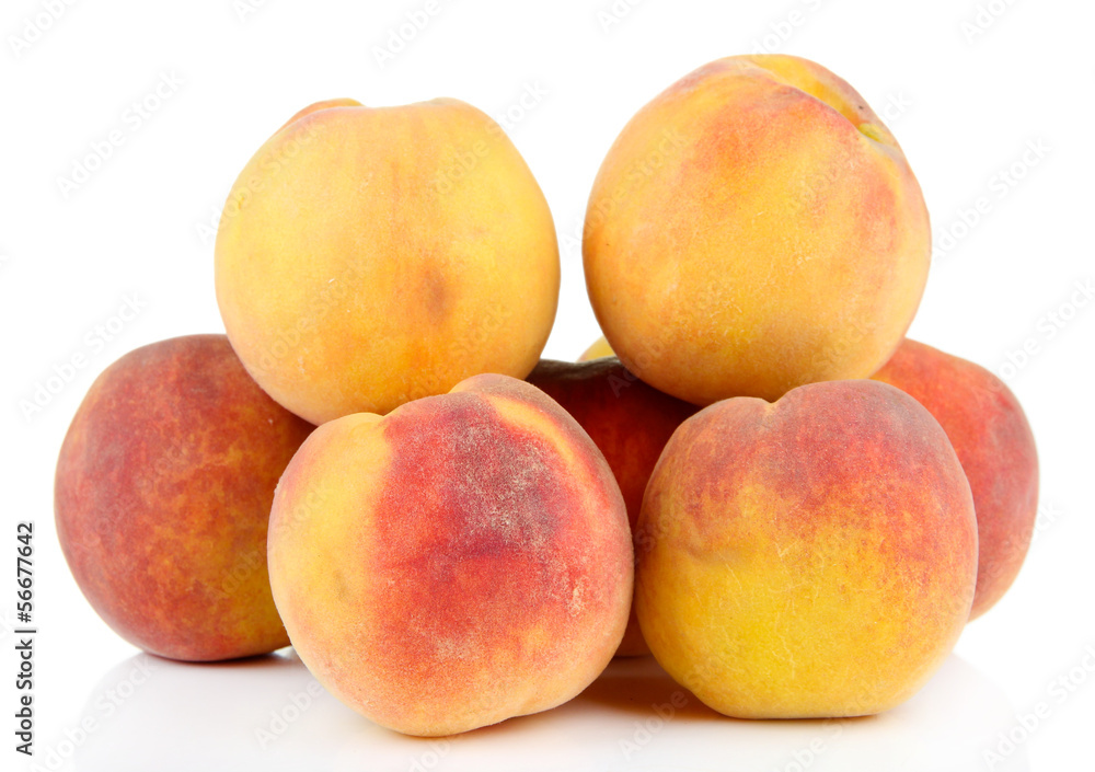 Ripe sweet peaches, isolated on white Ripe sweet peaches, isolated on white