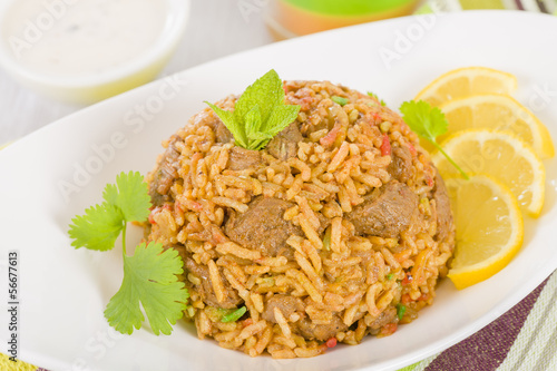 Mutton Byriani - Lamb and rice cooked with spices.