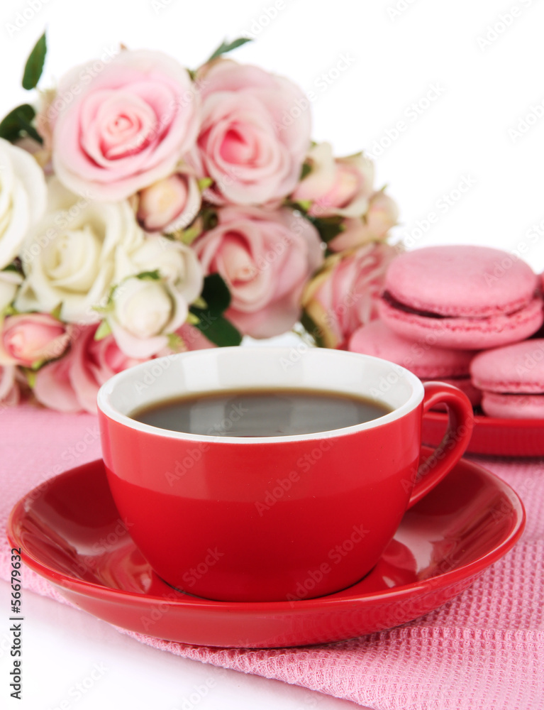 Coffee and macaroons isolated on white