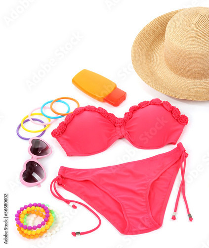 Swimsuit and beach items isolated on white