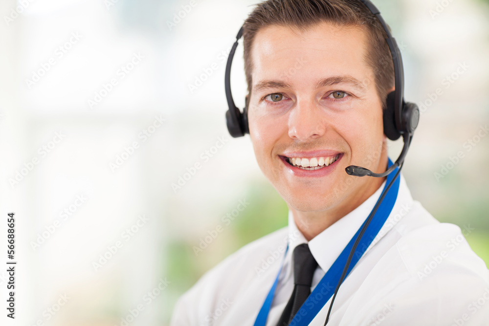 male call centre employee wearing a headset male call centre employee wearing a headset