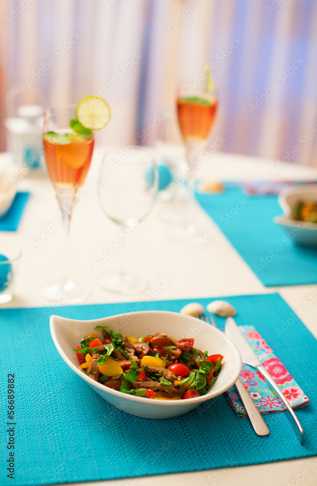 Delicious salad served with cocktails Delicious salad served with cocktails