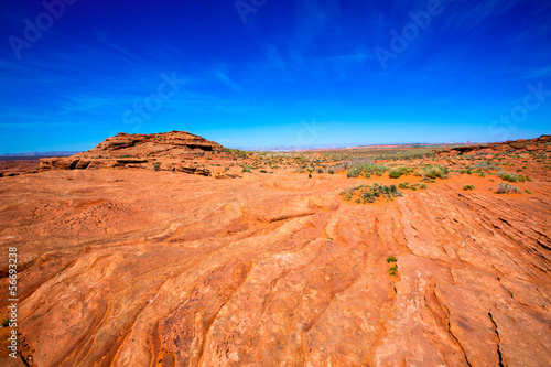 Arizona desert near Colorado river USA orange soil and blue sky