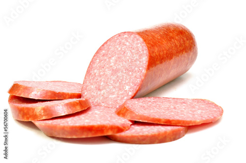 Foto Cooked and smoked sausage on a white background