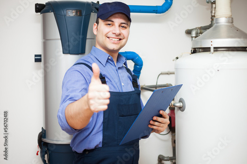 Foto Smiling plumber