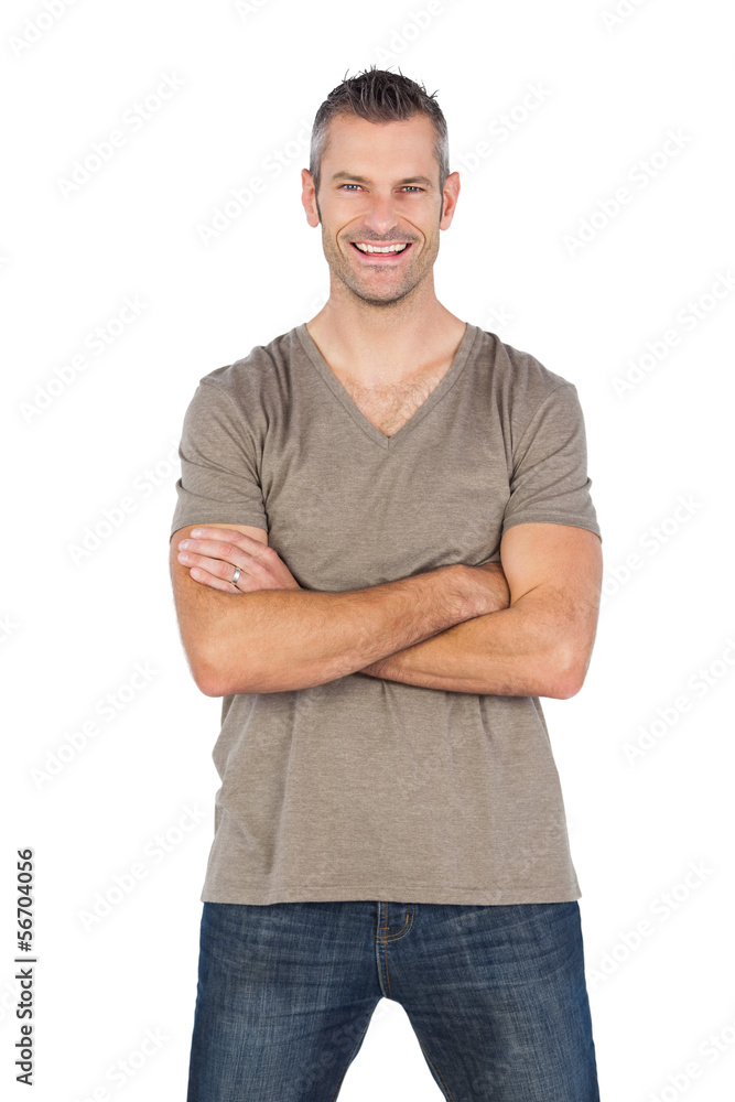 Cheerful man with arms crossed Cheerful man with arms crossed