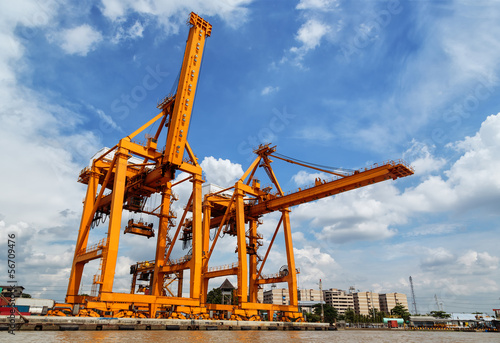 фотографія Cargo ship at the port  with blue sky