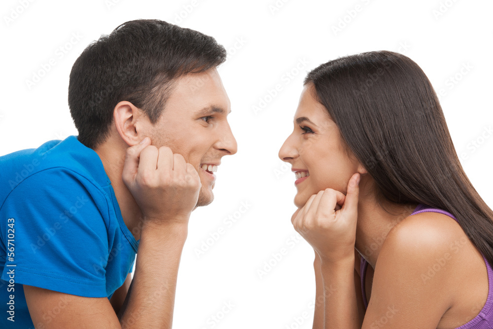 Loving couple. Beautiful young loving couple looking at each oth Loving couple. Beautiful young loving couple looking at each oth