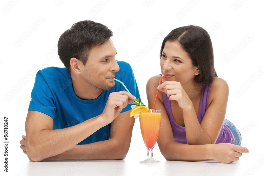Loving couple. Beautiful young loving couple drinking cocktails Loving couple. Beautiful young loving couple drinking cocktails