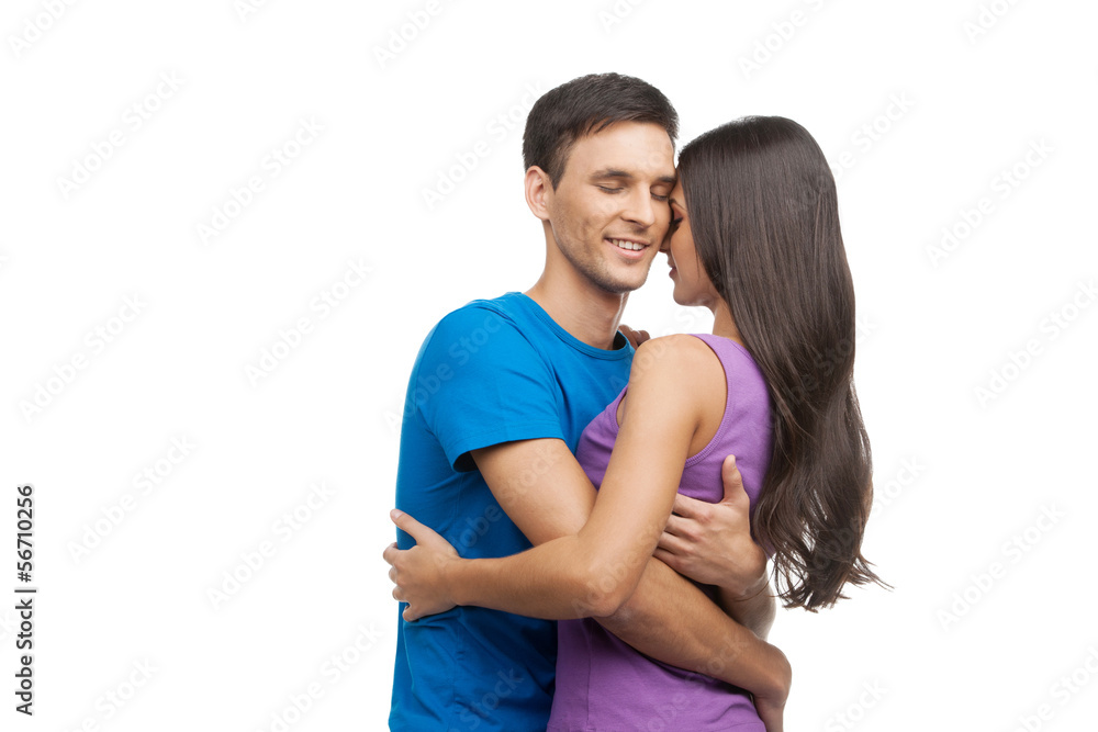 Naklejka premium Loving couple. Beautiful loving couple hugging while standing is