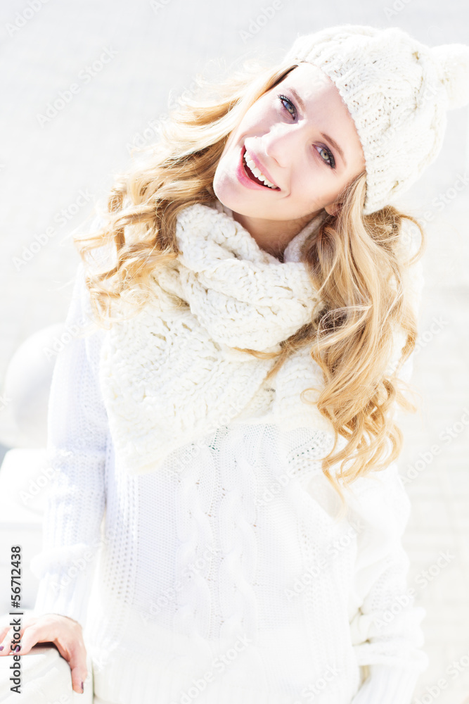Portrait of young beautiful woman wearing sweater and hat Portrait of young beautiful woman wearing sweater and hat