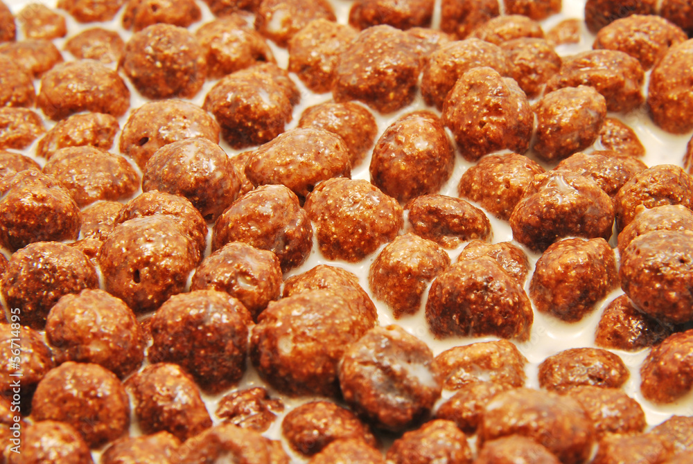 Chocolate cereals with milk background Chocolate cereals with milk background