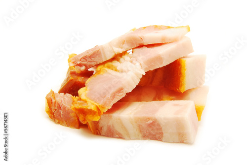 Pieces of smoked ham isolated on white