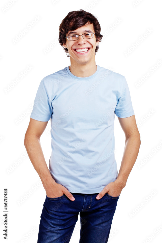 Smiling guy with hands in pockets Smiling guy with hands in pockets