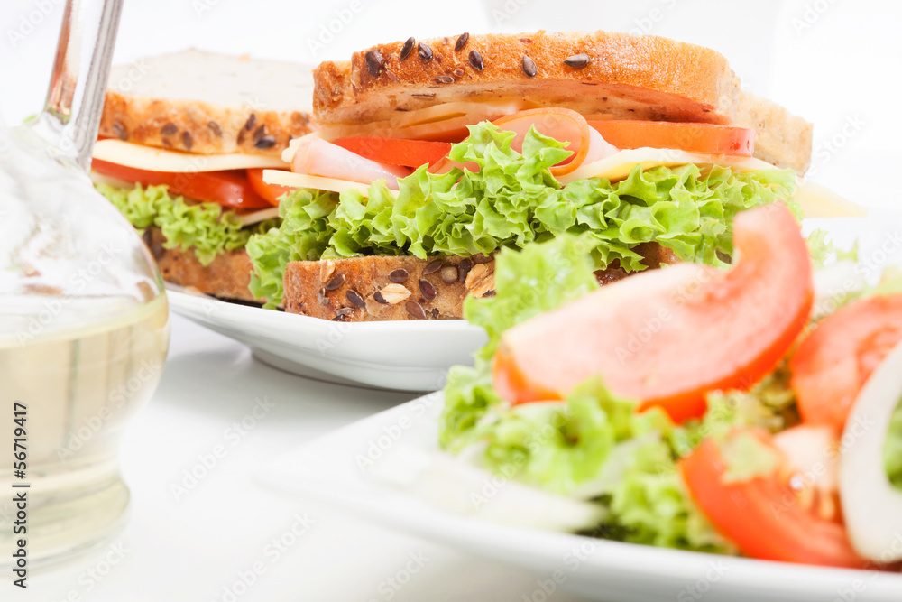 Salad and sandwiches. Selective focus