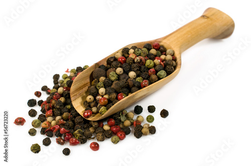 spice mix of peppers in a wooden scoop
