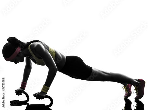 woman exercising fitness workout push ups silhouette