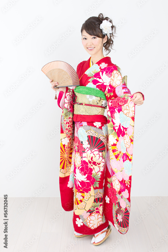 Beautiful asian kimono woman on white background Beautiful asian kimono woman on white background