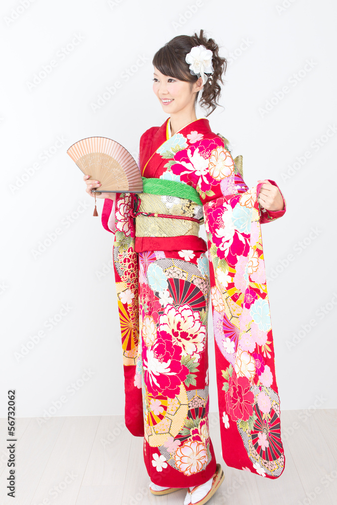 Beautiful asian kimono woman on white background Beautiful asian kimono woman on white background