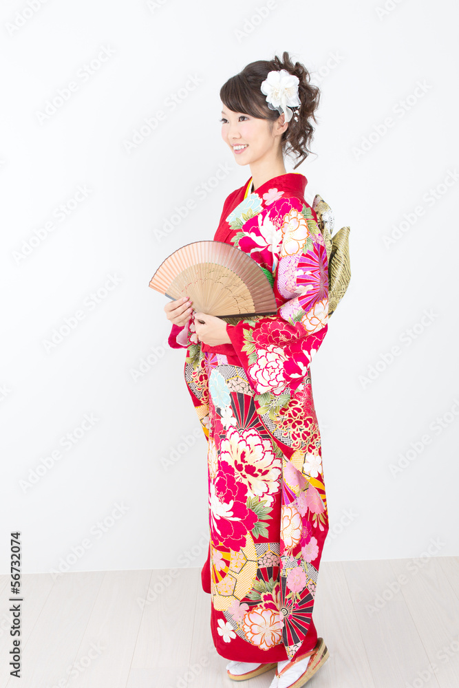 Fototapeta premium Beautiful asian kimono woman on white background
