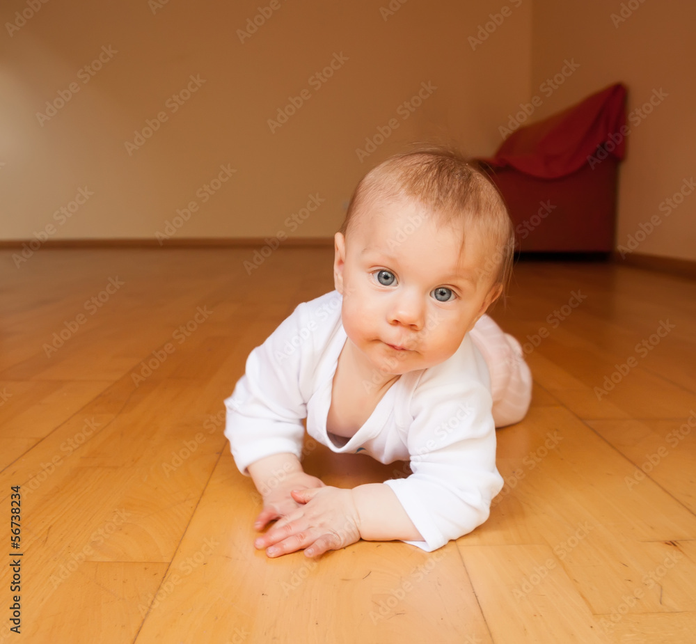 little girl in pink lying little girl in pink lying