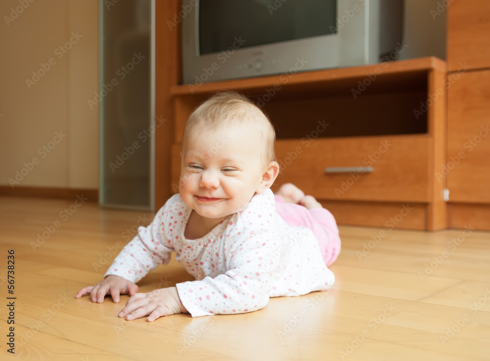 Baby crawling on the floor Baby crawling on the floor