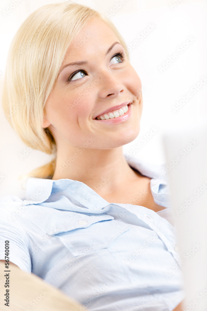 Close up shot of woman sitting with silver pc Close up shot of woman sitting with silver pc