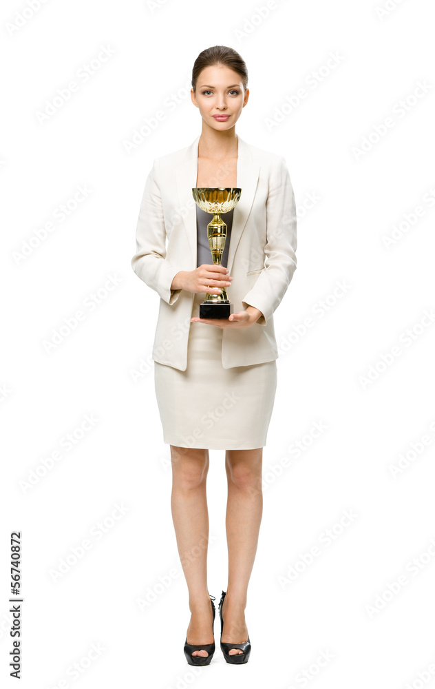 Full-length portrait of businesswoman keeping golden cup Full-length portrait of businesswoman keeping golden cup