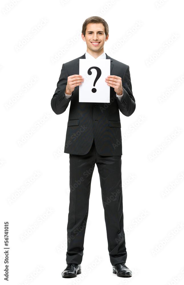 Full-length portrait of businessman handing question mark