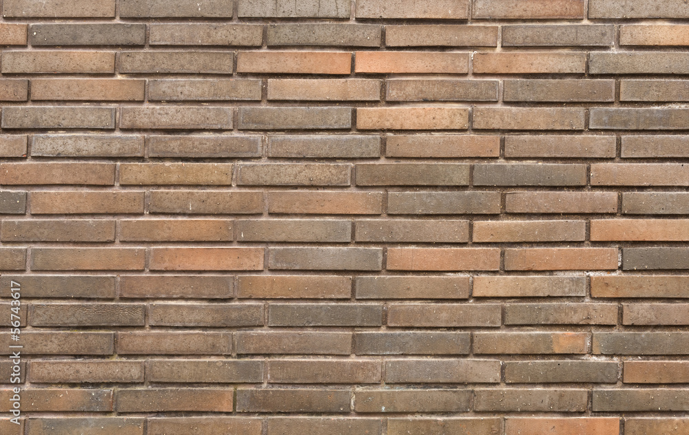 Background of new brick wall in dark tones Background of new brick wall in dark tones