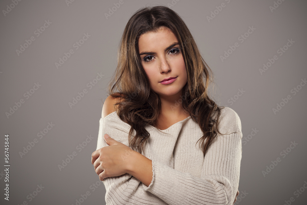 Portrait of beauty woman wearing warm cardigan Portrait of beauty woman wearing warm cardigan