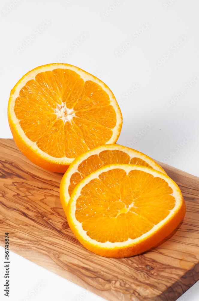 Orange slices on a wooden table