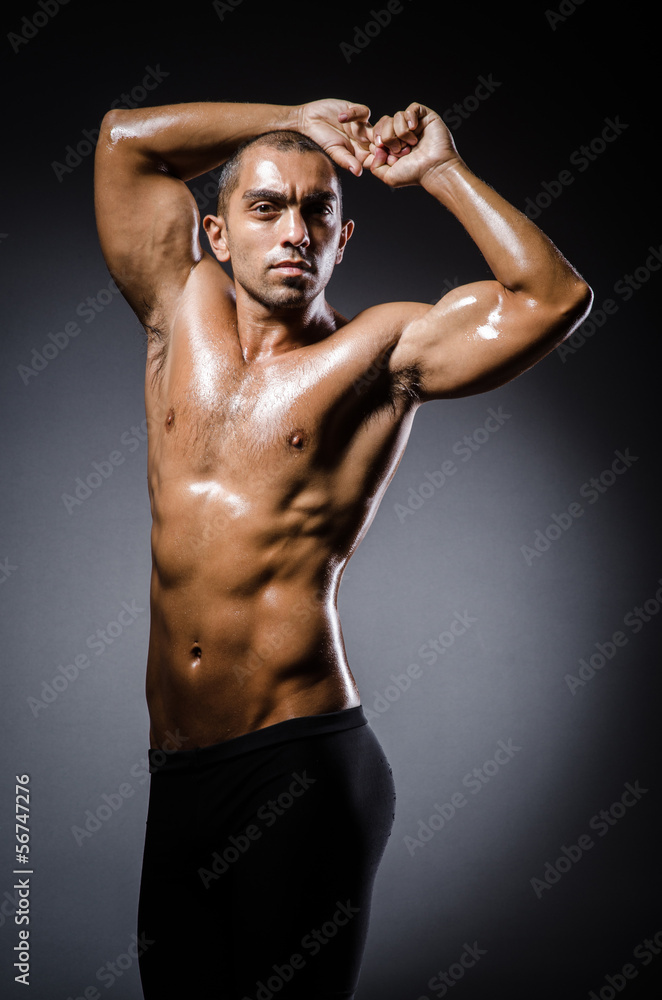Ripped young man in bodybuilding concept Ripped young man in bodybuilding concept