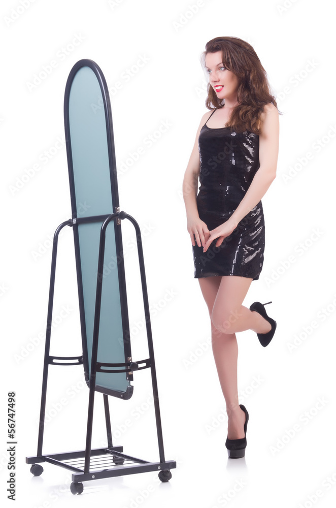 Woman trying new clothing on white Woman trying new clothing on white