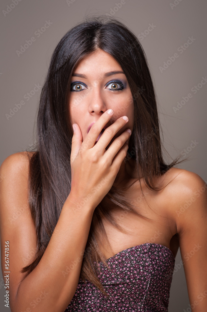Surprised brunette woman portrait. Surprised brunette woman portrait.