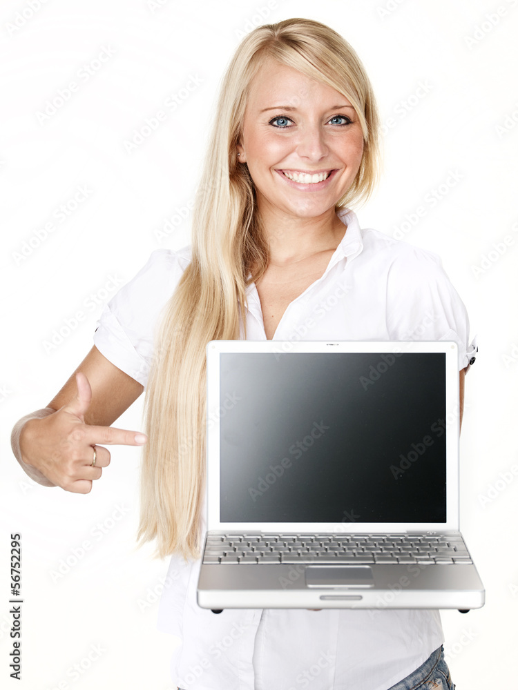 Business woman pointing at her laptop with copyspace Business woman pointing at her laptop with copyspace