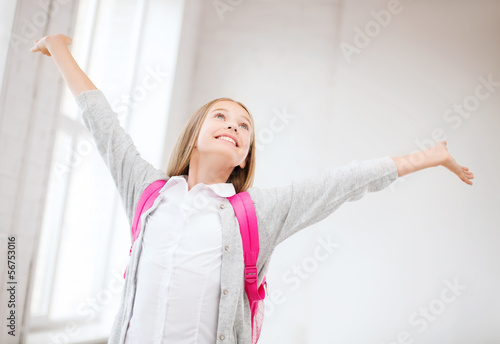 Wallpaper Mural happy teenage girl with raised hands Torontodigital.ca