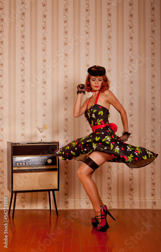 Dancing retro styled woman photo