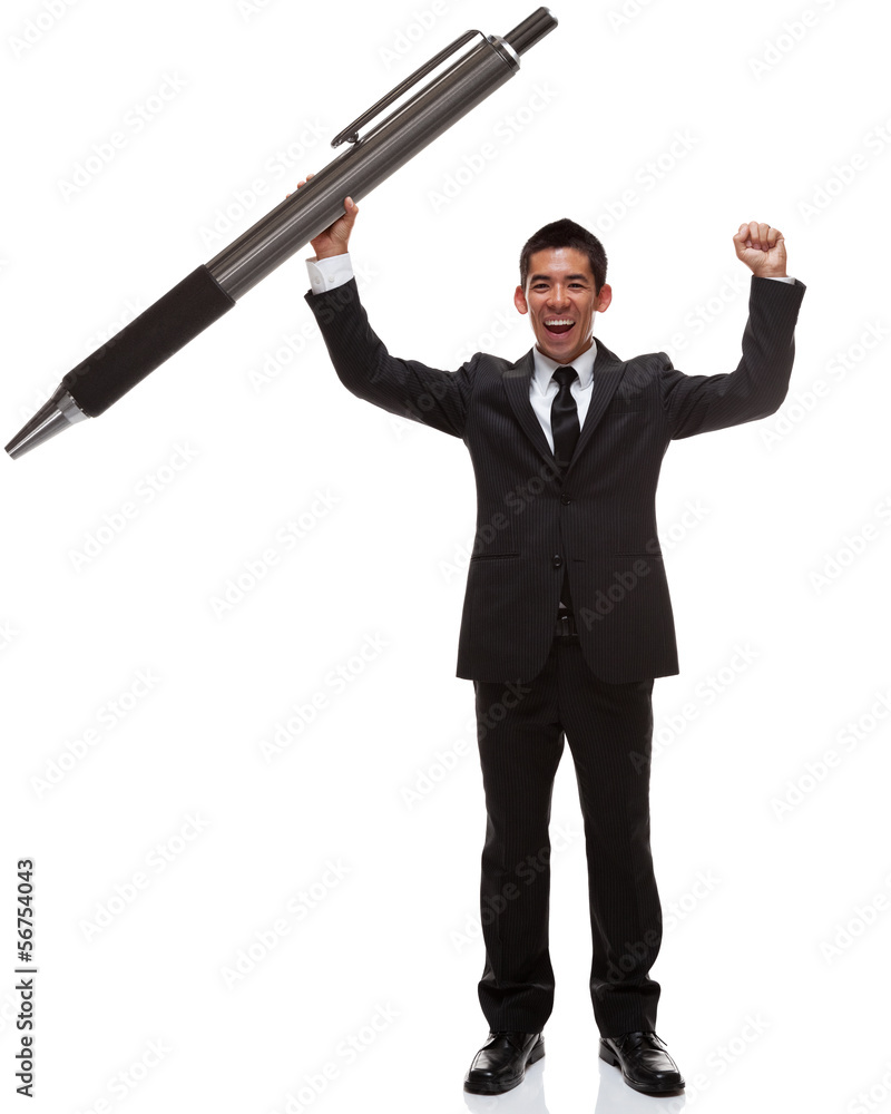 Business man celebrating holding a huge pen Business man celebrating holding a huge pen