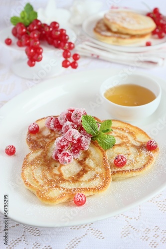 Pancakes with red currant and honey